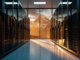 Modern data center with rows of black server racks framing a panoramic view of the Canadian Rocky Mountains at golden hour