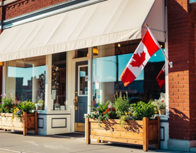 Canadian small business storefront on a main street with a Canadian flag