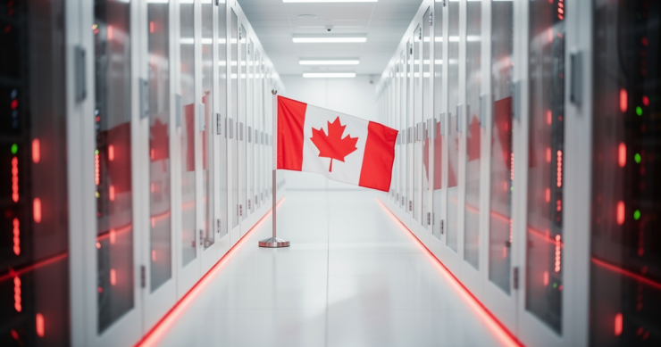 A small Canadian flag standing in a bright modern data centre aisle with red LED accents
